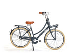 Navy bicycle with a brown seat on a white background
