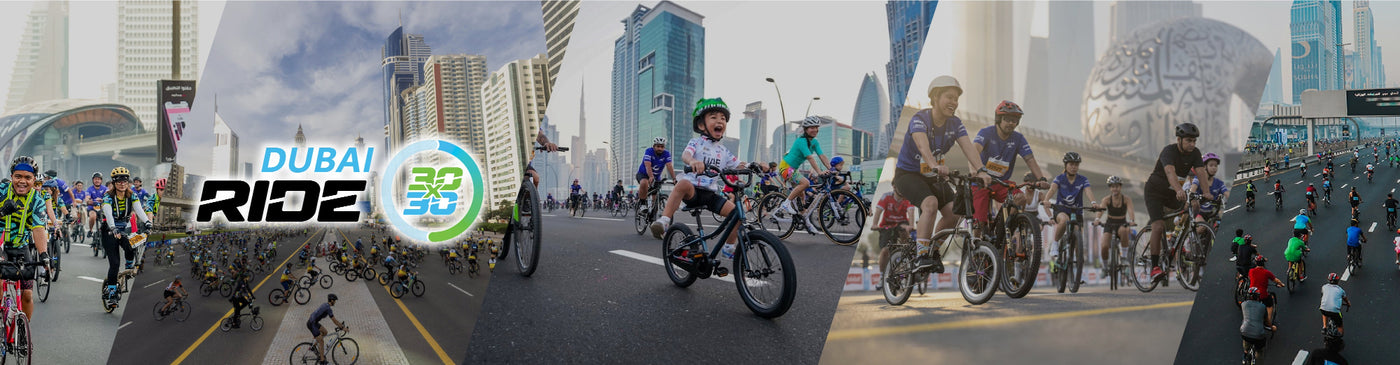 People riding bicycles on a city street with Dubai Ride 360 logo.