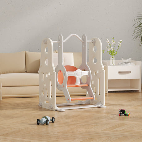 Children's play swing with orange seat in a living room setting