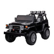 Black toy car resembling a Toyota model on a white background