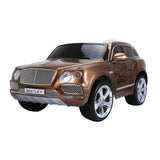 A bronze Bentley Bentayga kids electric ride-on car with a luxurious interior and silver wheels.