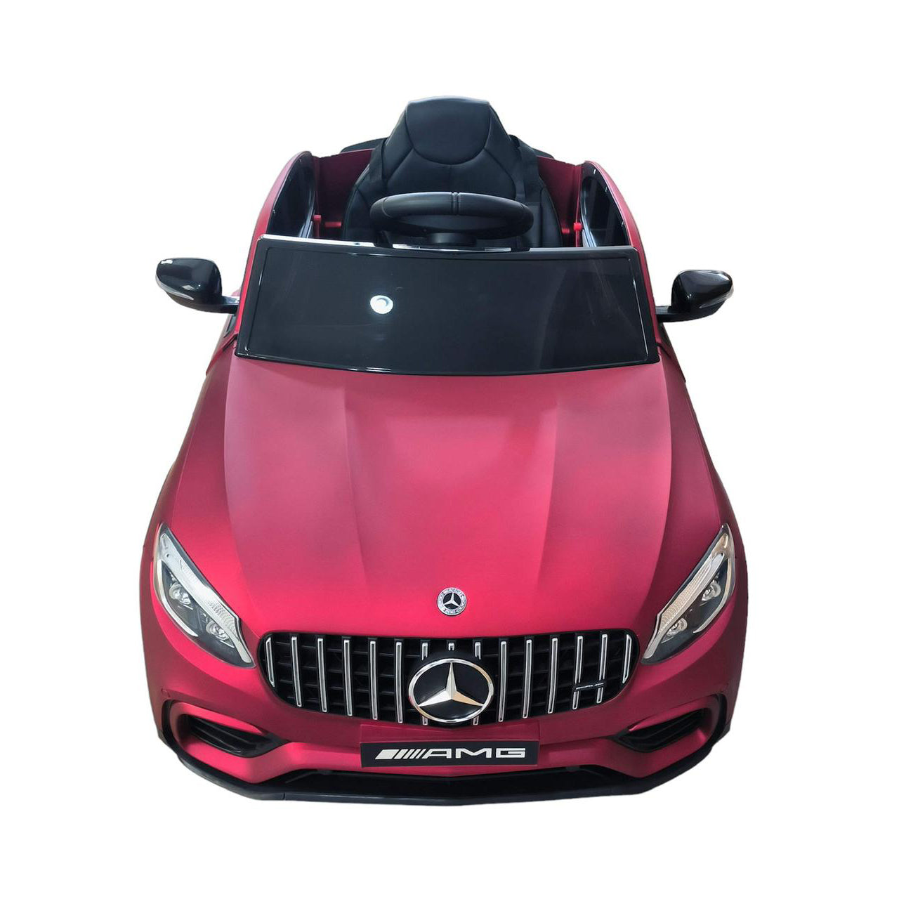 Red toy car with Mercedes-Benz logo on a white background