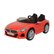 Red BMW z4 toy car with black interior on a white background