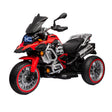 Red and black toy motorcycle on a white background