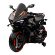 Black and red motorcycle toy on a white background