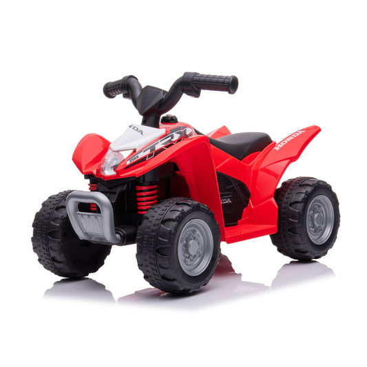 Red toy ATV with black tires and Honda logo on a white background