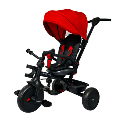 Red and black child's tricycle with canopy on a white background