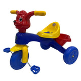 Colorful children's tricycle with red, blue, and yellow colors on a white background