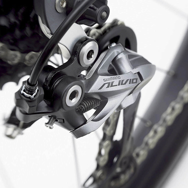 Shimano Alivio gear mechanism on a bicycle with a blurred background