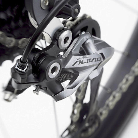 Shimano Alivio gear mechanism on a bicycle with a blurred background