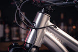 Close-up of a bicycle frame with blurred background