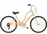 Orange bicycle with black seat and tires on a white background