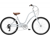 White bicycle with a brown seat on a white background